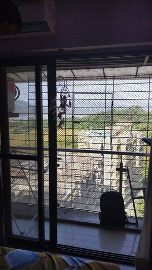 Balcony in 1 BHK Apartment at KM Horizon Flora, Ghodbunder Road – for Sale