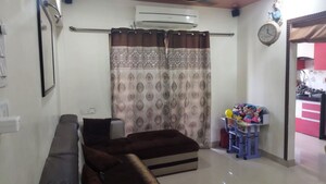 Living Room in 1 BHK Apartment at KM Horizon Flora, Ghodbunder Road – for Sale