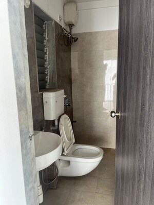 Bathroom in 2 BHK Apartment at Thanekar Civic, Badlapur East – for Sale