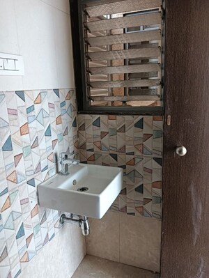 Bathroom in 2 BHK Apartment at Ashapura Asha Icon, Dombivli East – for Rent