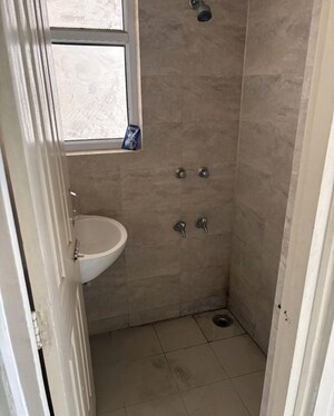 Bathroom in 2 BHK Apartment at Wave Dream Homes, Wave City – for Rent