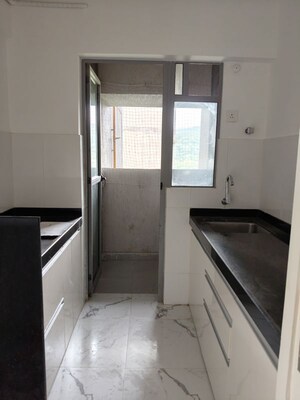 Kitchen in 1 BHK Apartment at Aniline Avanya Tower B, Dahisar East – for Sale