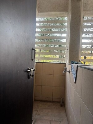 Bathroom in 2 BHK Apartment at Dwarkadheesh Gardens, Rahatani – for Rent
