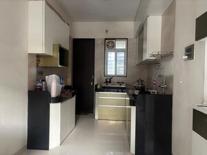 Kitchen in 2 BHK Apartment at Dwarkadheesh Gardens, Rahatani – for Rent