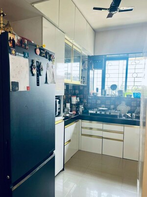 Kitchen in 2 BHK Apartment at Karan Palms, Warje – for Sale