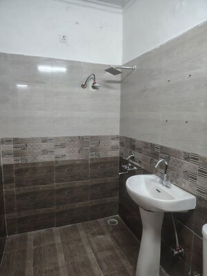 Bathroom in 2 BHK Builder Floor at Shri Devaji Residency, Dhakoli – for Sale