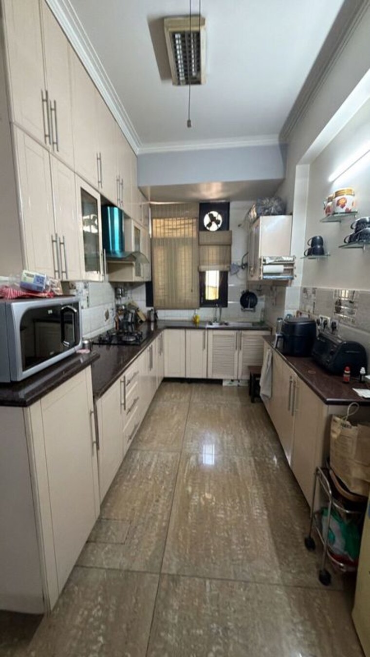 Kitchen, gaurs-green-avenue 4 Bedroom 1993 Sq.Ft. Apartment In Abhay Khand Ghaziabad 10245692