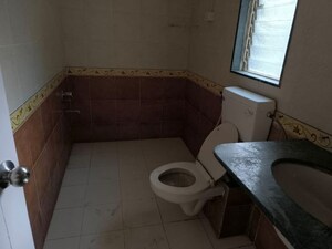 Bathroom in  Apartment at Purple Five gardens, Rahatani – for Rent