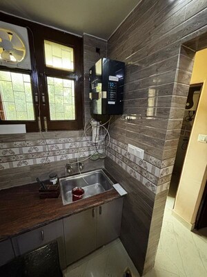 Kitchen in 2 BHK Apartment at Dhawal Giri Apartment, Sector 34 – for Rent