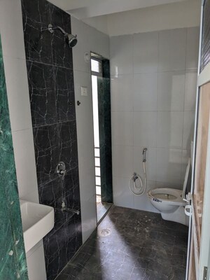 Bathroom in 2 BHK Apartment at Jash Sai Galaxy, Padle – for Sale