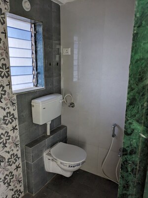 Bathroom in 2 BHK Apartment at Jash Sai Galaxy, Padle – for Sale