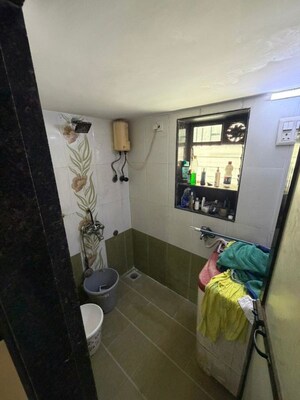 Bedroom in 2 BHK Apartment at Dheeraj Ganga, Malad West – for Rent