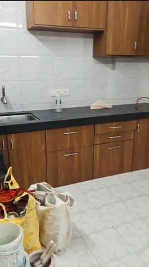 Kitchen in 2 BHK Apartment at Indra Darshan Apartment, Andheri West – for Rent