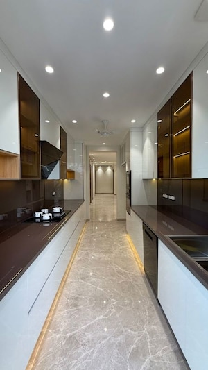 Kitchen in 4 BHK Builder Floor at Sushant Lok I – for Sale