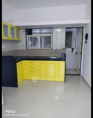 Kitchen in 1 BHK Apartment at Shri Vardhaman Vatika, Thergaon – for Sale
