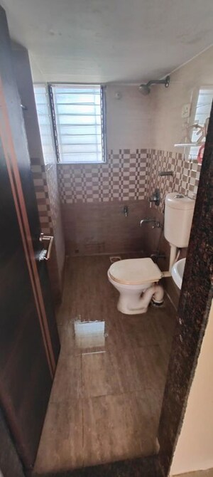 Bathroom in 1 BHK Apartment at Kishor Sukur Enclave A, Ghodbunder Road – for Sale