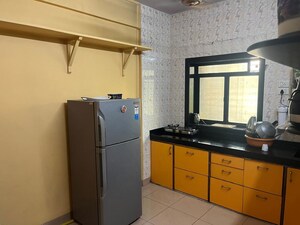 Kitchen in 2 BHK Apartment at Ashtavinayak CHS Chinchpokli, Chinchpokli – for Rent