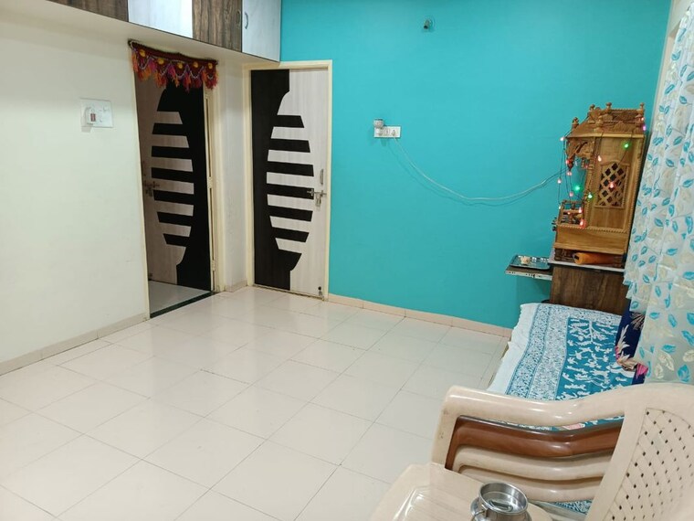 Living Room, aashiana-society 3 Bedroom 985 Sq.Ft. Apartment In Narhe Pune 10244348