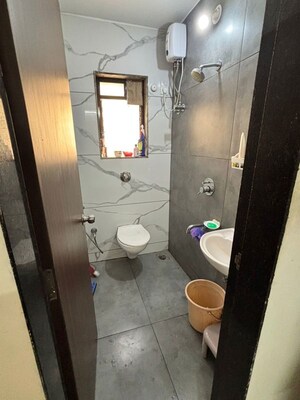 Bathroom in 1 BHK Apartment at Raunak Unnathi Woods Phase 6, Ghodbunder Road – for Rent