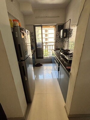 Balcony in 1 BHK Apartment at Raunak Unnathi Woods Phase 6, Ghodbunder Road – for Rent