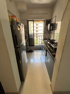 Building Lobby in 1 BHK Apartment at Raunak Unnathi Woods Phase 6, Ghodbunder Road – for Rent