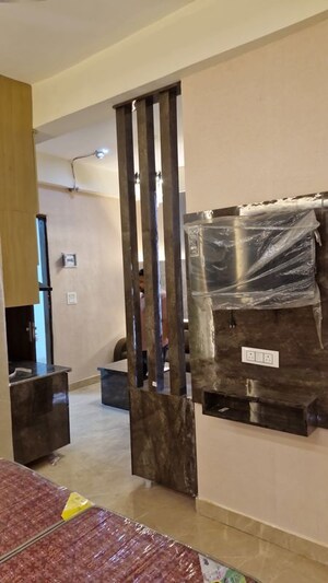 Living Room in Studio Apartment at VHR Winsten Park, Knowledge Park V Greater Noida – for Rent