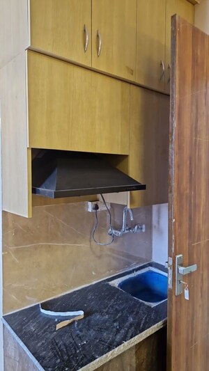 Kitchen in Studio Apartment at VHR Winsten Park, Knowledge Park V Greater Noida – for Rent