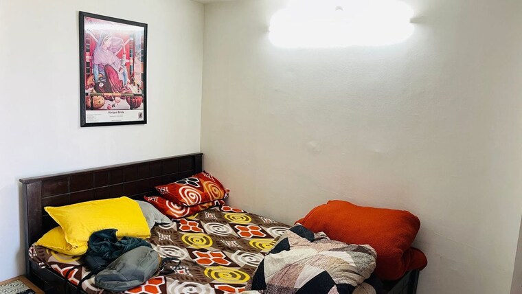 Bedroom, signature-global-the-millennia 2 Bedroom 700 Sq.Ft. Apartment In Sector 37d Gurgaon 10246936