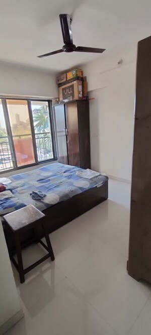 Bedroom in 1 BHK Apartment at Oyster Hiral Legacy, Kandivali West – for Rent