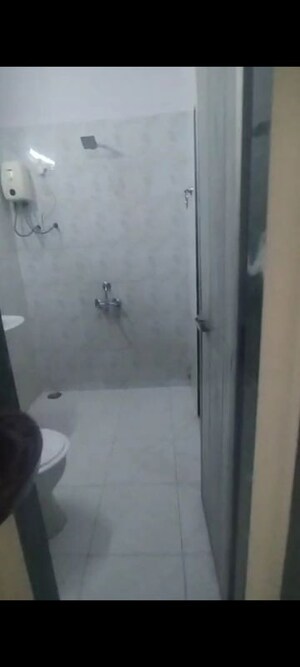Bathroom in 1 BHK Apartment at Rim Zim CHS, Vashi Sector 10a – for Rent