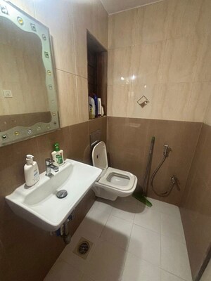 Bathroom in 2 BHK Apartment at Powai Cosmopolitan CHS, Powai – for Rent