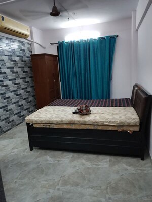 Bedroom in 2 BHK Apartment at Powai Cosmopolitan CHS, Powai – for Rent