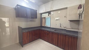 Kitchen in 3 BHK Apartment at Rosa Bella, Ghodbunder Road – for Rent