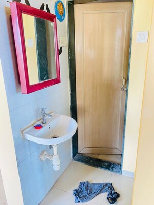 Bathroom in 1 BHK Apartment at Puranik City, Kasarvadavali – for Rent