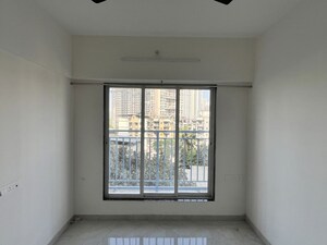 Master Bedroom in 1 BHK Apartment at Shree Krushna Tower, Mulund West – for Rent