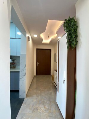 Building Lobby in 2 BHK Apartment at Unitech Fresco, Sector 50 – for Rent