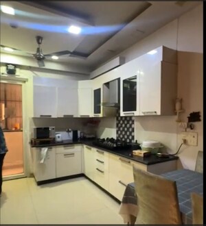 Kitchen in 4 BHK Apartment at Saya Zenith, Ahinsa Khand 2 – for Sale