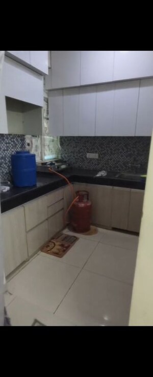 Kitchen in 2 BHK Apartment at Bluemoon Central, Raj Nagar Extension – for Sale
