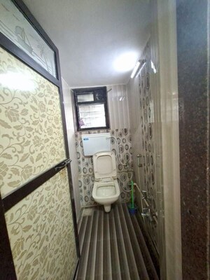 Bathroom in 1 BHK Apartment at Panchayatan CHS, Borivali West – for Rent