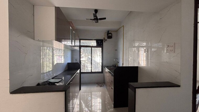 Kitchen, dosti-eastern-bay 2 Bedroom 666 Sq.Ft. Apartment In Wadala Mumbai 10248118