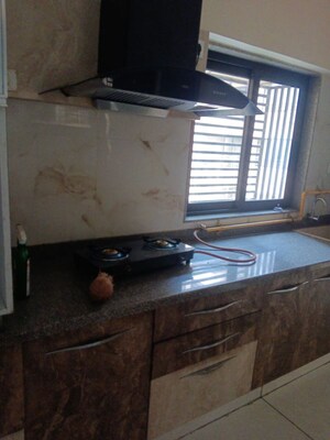 Kitchen in 3 BHK Apartment at Kavisha Pebble Bay, Chandkheda – for Rent