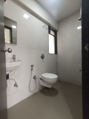 Bathroom in 1 BHK Apartment at Triveni Apartments Tilak Nagar, Tilak Nagar – for Rent