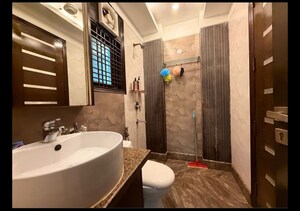 Bathroom in 3 BHK Builder Floor at Chittaranjan Park – for Sale