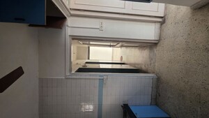 Kitchen in 1.5 BHK Apartment at Kachnar CHS Vasant Vihar, Vasant Vihar – for Sale