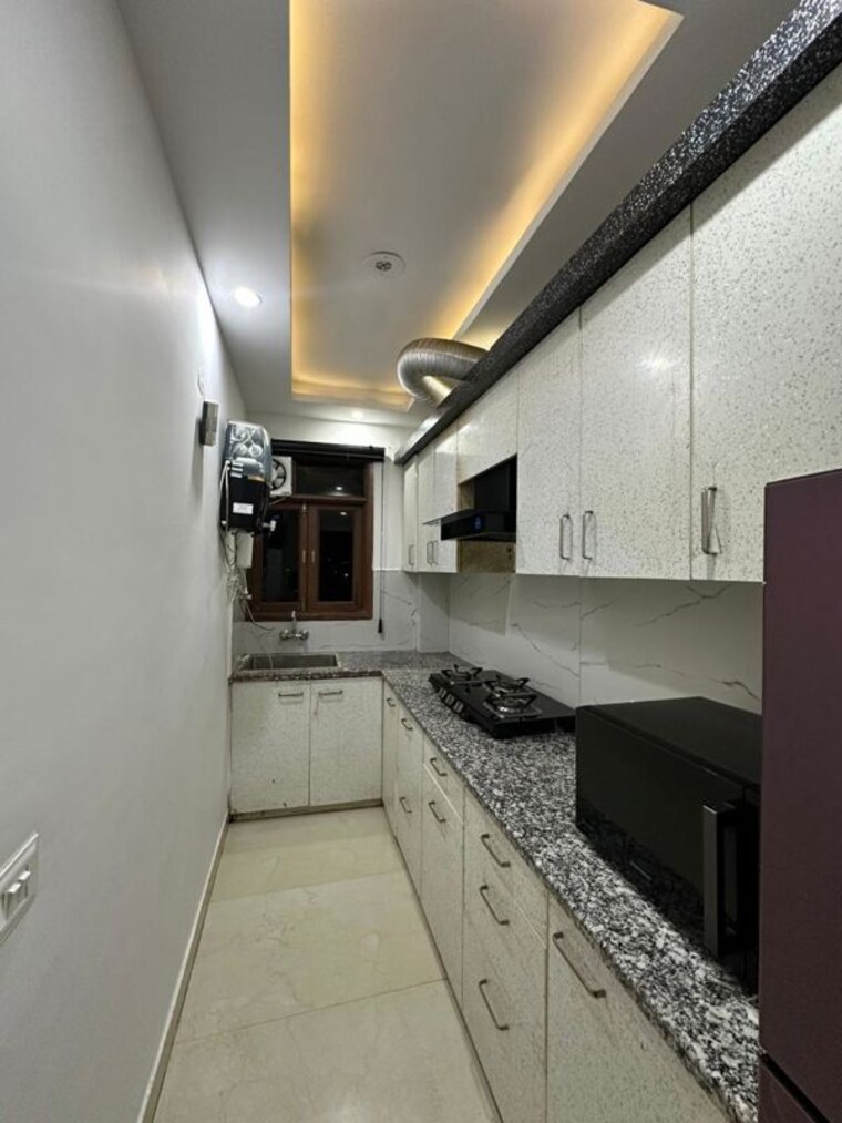 Kitchen, chattarpur 2 Bedroom 85 Sq.Yd. Builder Floor In Chattarpur Delhi 10248578