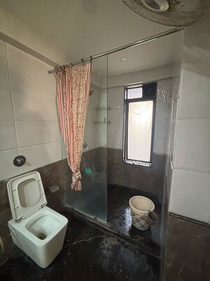 Bathroom in 4 BHK Apartment at DLH Sorrento, Veera Desai Road – for Rent