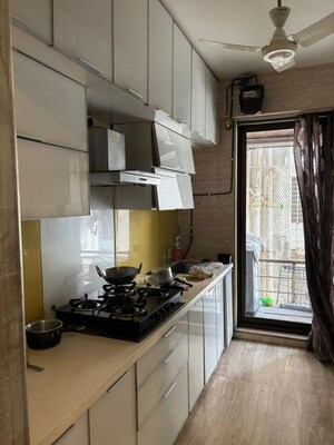 Kitchen in 4 BHK Apartment at DLH Sorrento, Veera Desai Road – for Rent