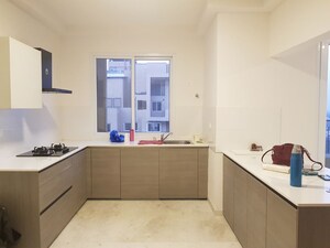 Kitchen in 2 BHK Apartment at Bhartiya Nikoo Homes, Thanisandra Main Road – for Rent