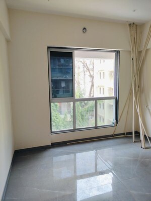 Room in 2 BHK Apartment at Malad West – for Sale