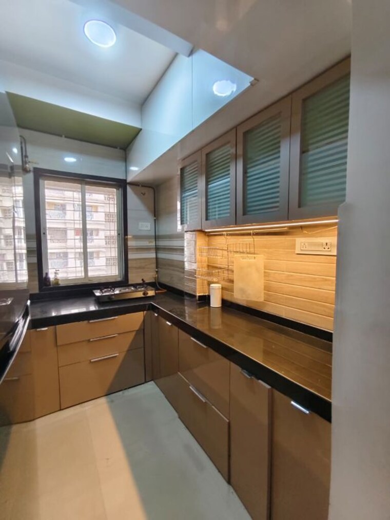 Kitchen, unique-greens-ghodbunder-road 1 Bedroom 425 Sq.Ft. Apartment In Ghodbunder Road Thane 10249048